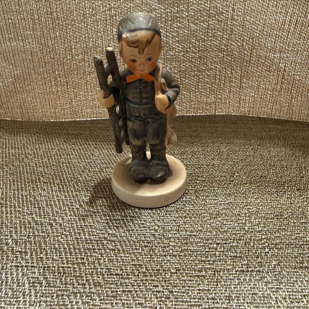 Hummel-Style Boy Figurine in Gray and Cream